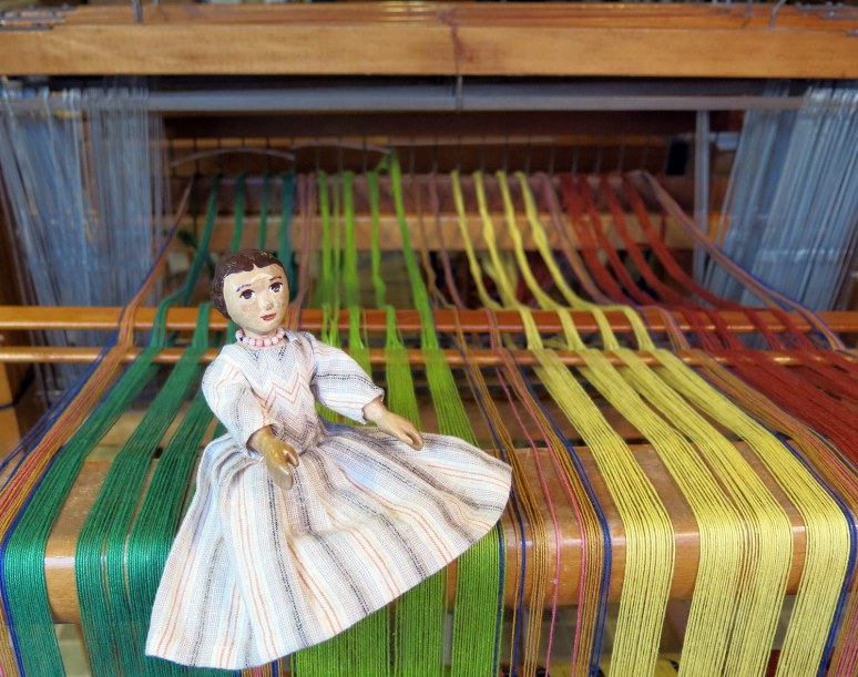 Sitting on the back beam.