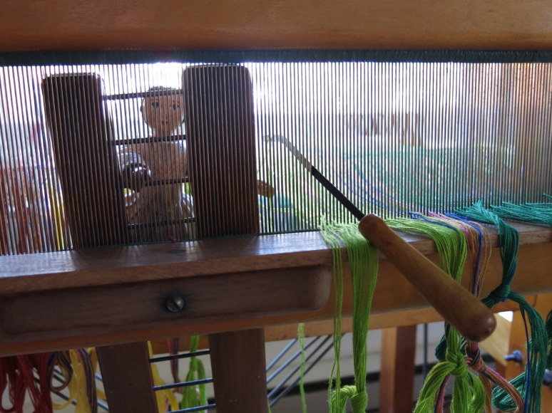 Constance reaches for the hook.