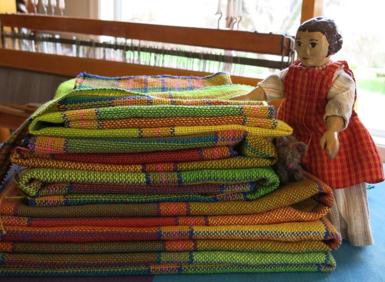 A lovely stack of weavings