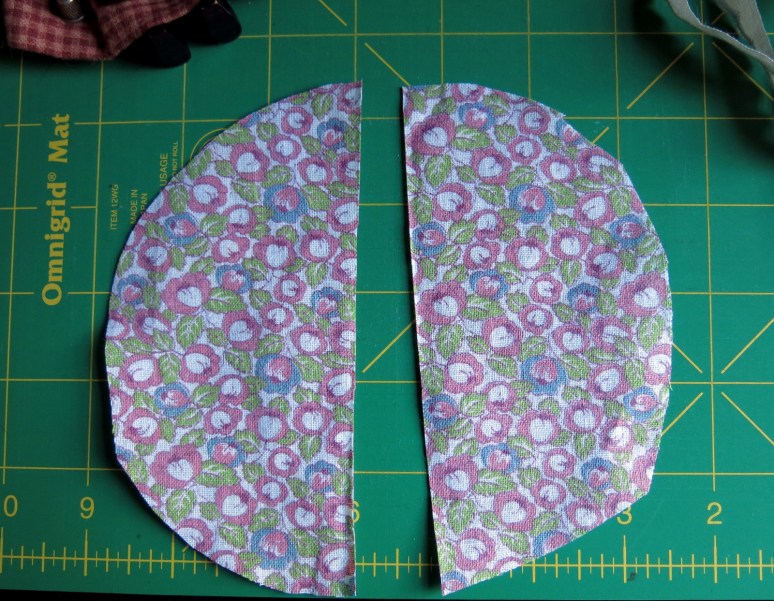 Cut the circle of fabric in half