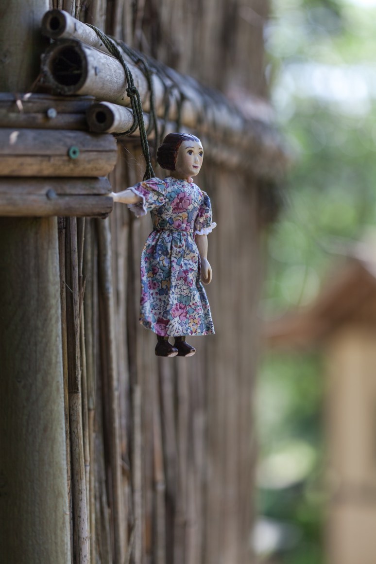 holding on by her fingernails