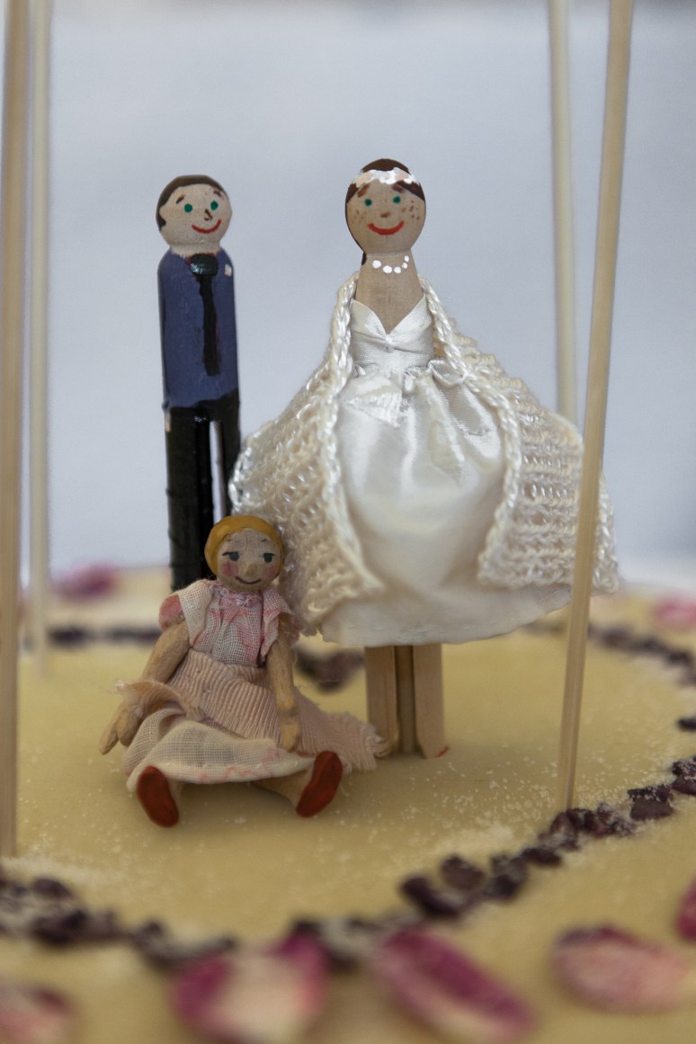 The Happy Clothes Peg Couple and their wee one